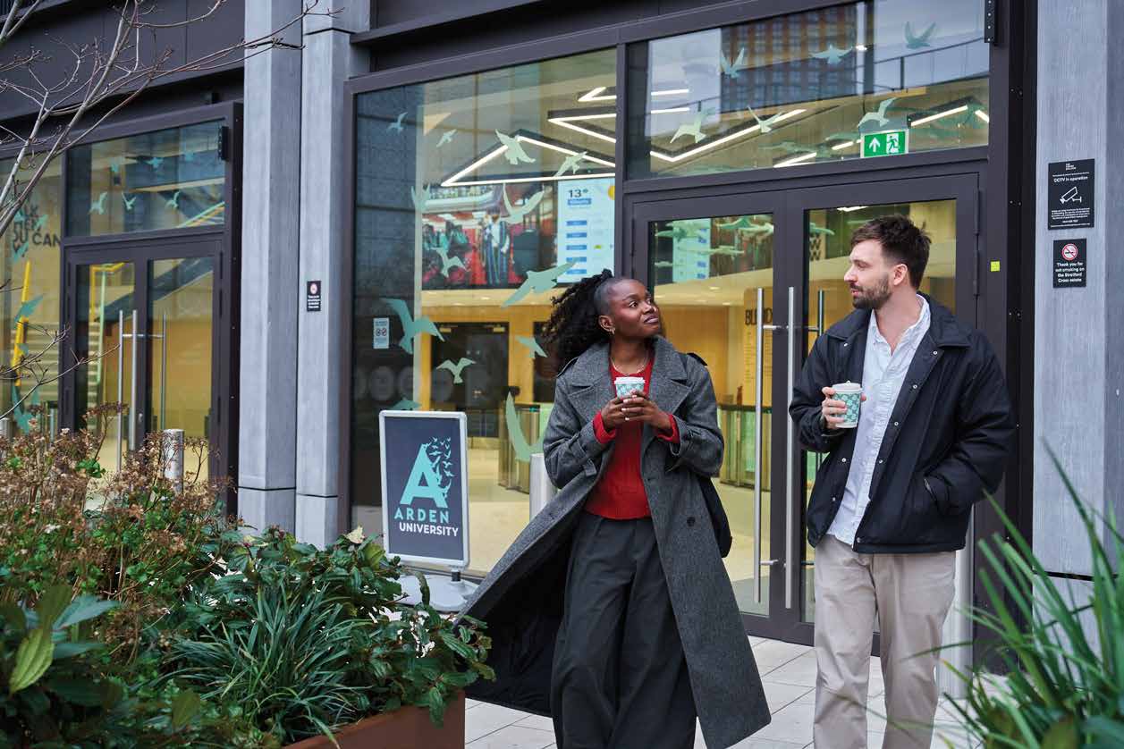 Two Arden students chatting outside a study centre